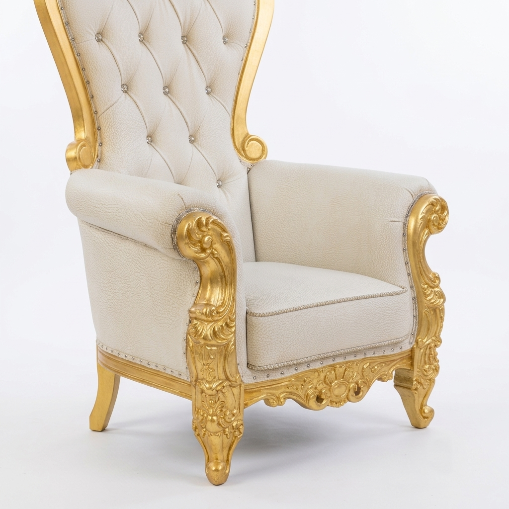 A luxury high-back wingback armchair with cream-colored tufted upholstery and ornate gold gilded carved wooden legs and arms, set against a plain white studio background.