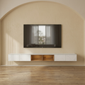 A modern floating TV stand with white marble-look side panels, a white top surface, and two open wooden center compartments, mounted against a beige wall with an arched molding above a TV. The scene is set in a real interior with wood flooring, so this is Lifestyle rather than Product/Packaging.