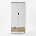 A modern two-door wardrobe with white doors, black circular pull handles, a light oak wood base with two drawers, and light wood legs, shown on a white background.