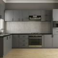 A modern L-shaped kitchen featuring gray cabinets, black countertops, a light gray stone backsplash, and built-in stainless steel appliances including a gas stove, oven, and range hood.