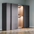 A modern sliding wardrobe or closet door system shown in a room setting, with two outer doors open to reveal a warm wood interior with built-in lighting.