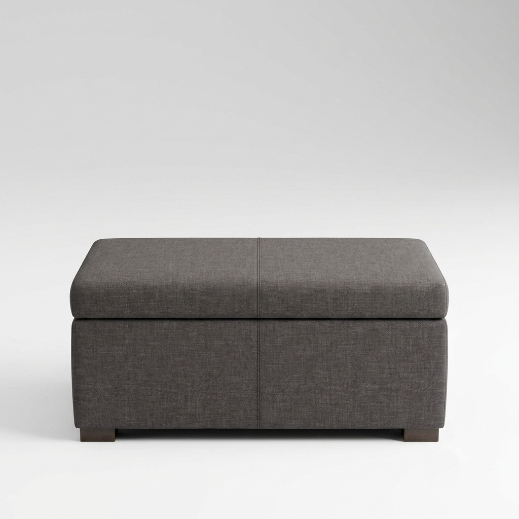A rectangular storage ottoman with a dark gray textured fabric upholstery and dark wooden feet, shown against a light gray studio background.