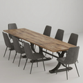 A long rectangular dining table with a rustic brown wood top and black metal base, surrounded by eight gray upholstered chairs with black legs, photographed in a clean studio setting.